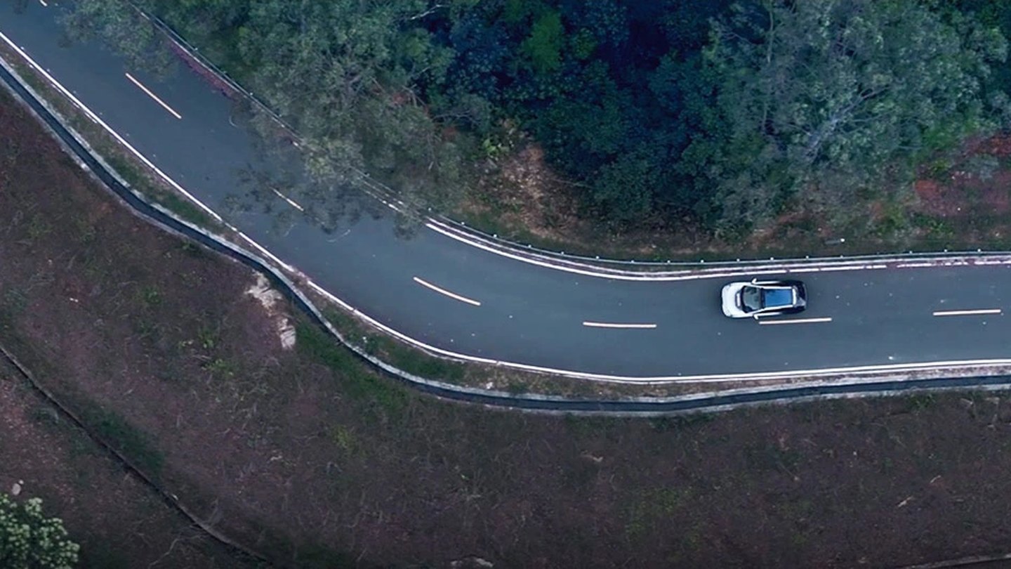 A Garcia-equipped car taking a tight mountain bend