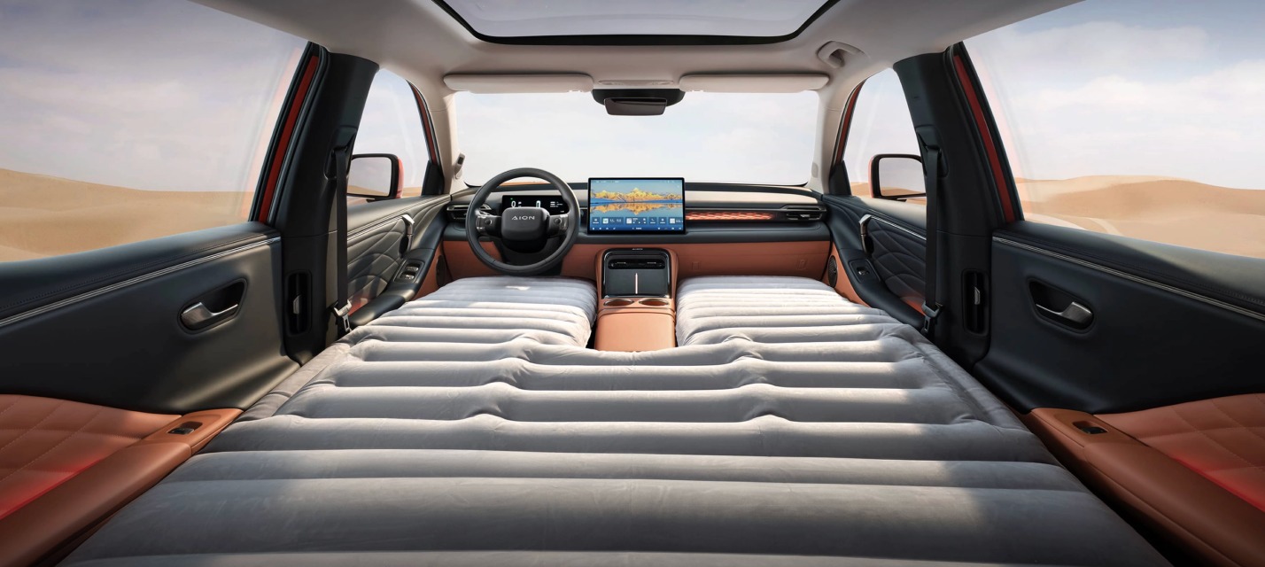 Rear seats folded flat inside the AION V