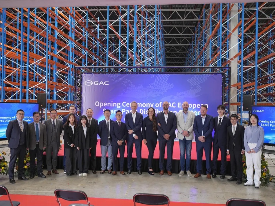 Guests and the GAC team together for a group photo at the ceremony